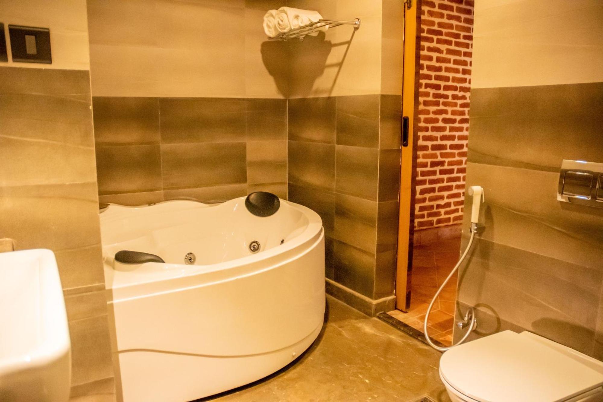 Basera Boutique Hotel Kathmandu Exterior photo A modern bathtub